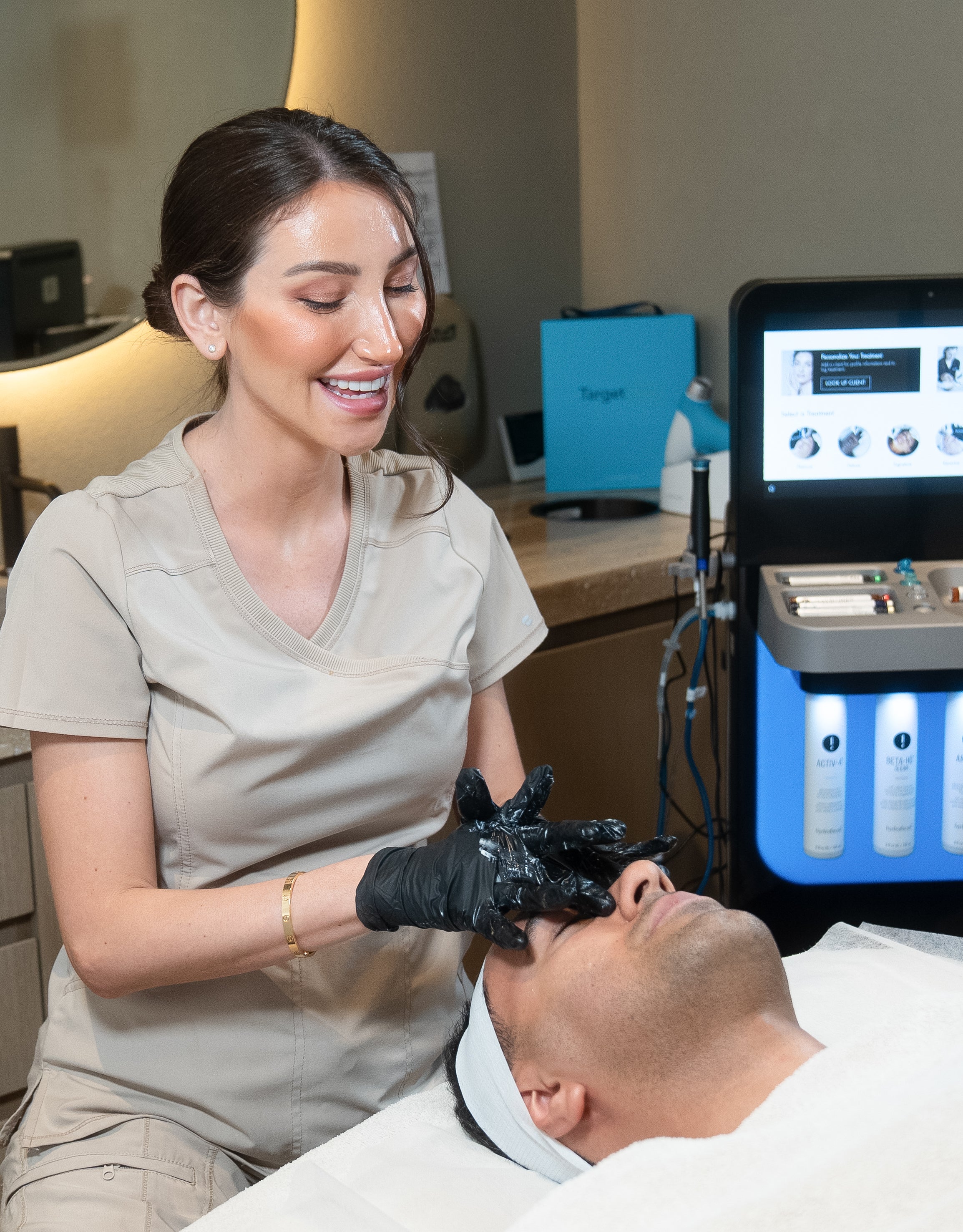 Practitioner gently cleansing the client’s face before starting the BBL laser treatment