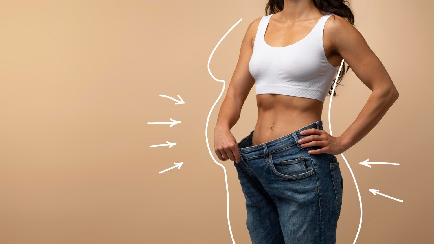 A woman in a white sports bra and loose jeans represents the fat grafting surgery.