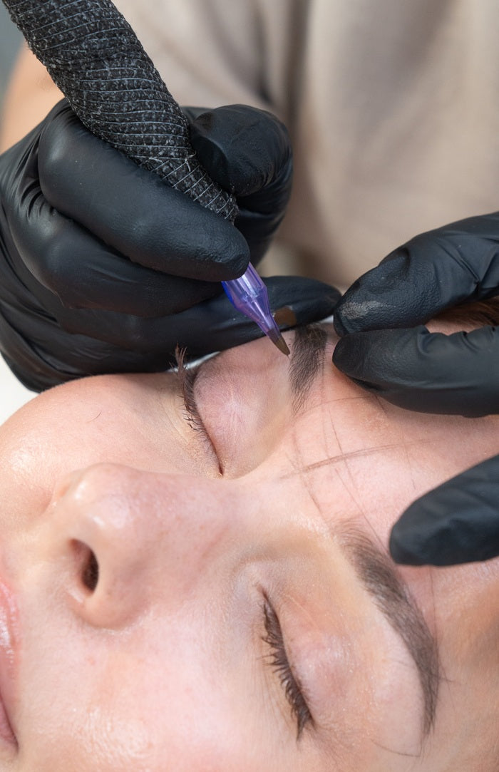 Brow mapping and shaping before Powder Brows.