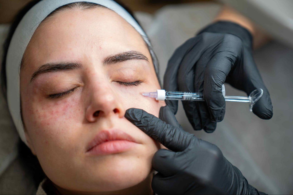 Woman gets Rejuran treatment injection