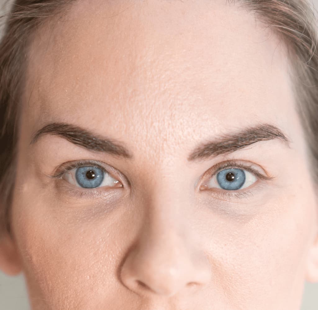 Korean lash lift treatment of a woman before the session, showing no lifted and curled lashes, appearing flat and untreated.