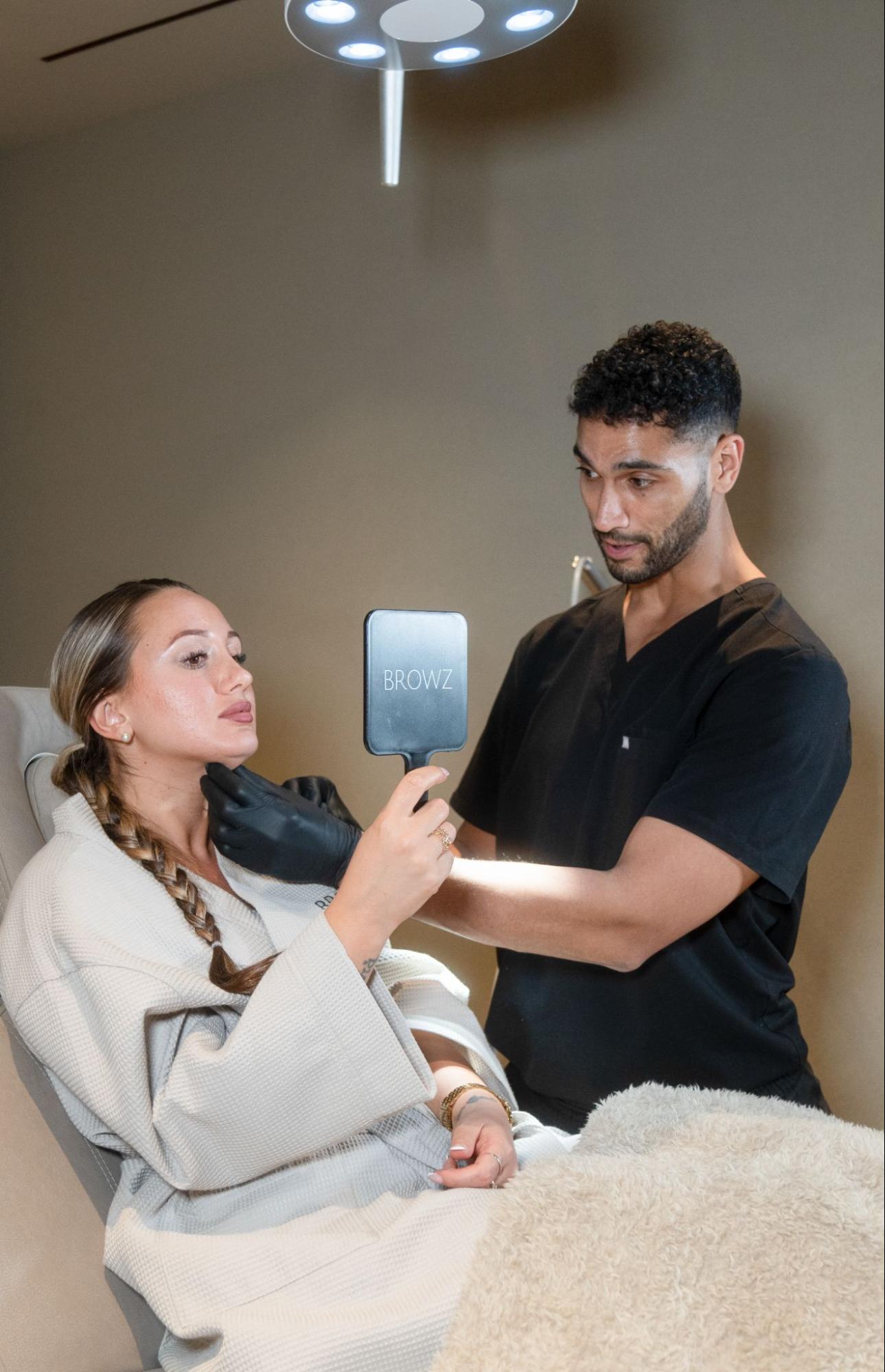 Client post PRF under-eye treatment with a specialist at BROWZ Dubai, showing brighter under-eye skin and reduced dark circles.