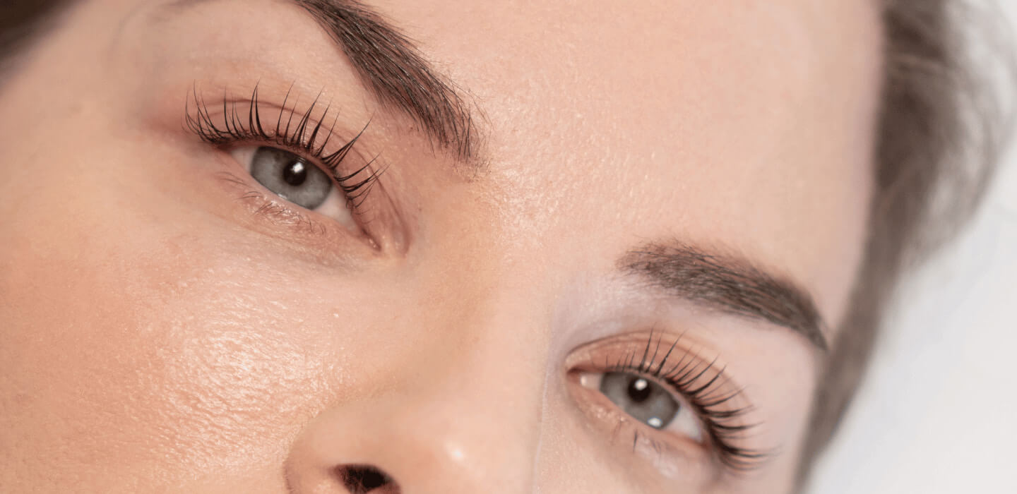 A woman’s eyes after Korean lash lift treatment at BROWZ in Dubai, looking naturally lifted, defined, voluminous, and glossy.
