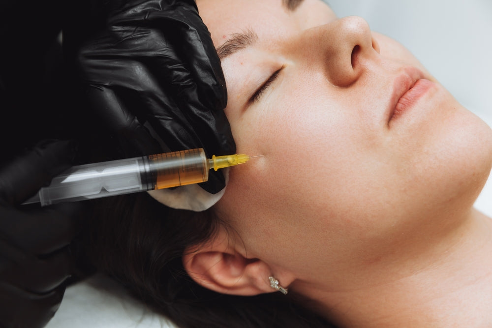 Close-up of a woman’s face during PRP treatment Dubai at BROWZ, showing natural skin condition for rejuvenation treatment.