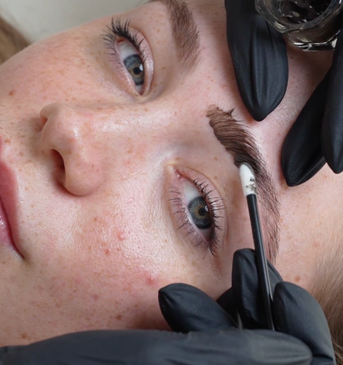 HD Brows tinting with a therapist applying customised colour to enhance brow depth, definition, and shape for balanced results